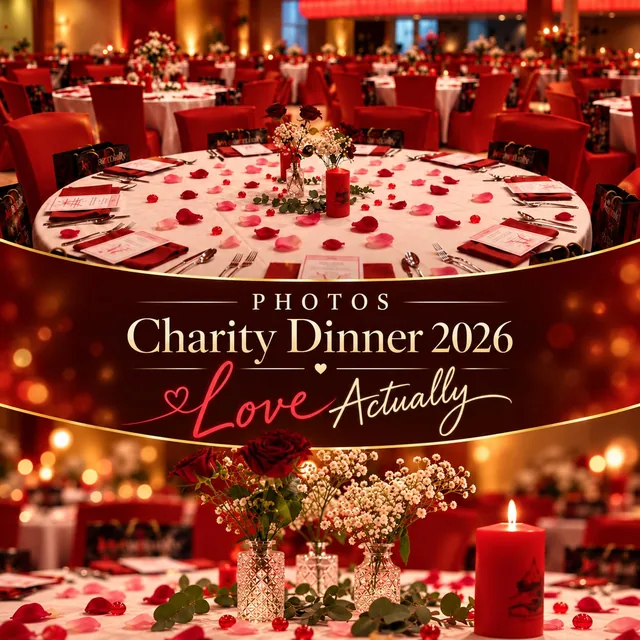 Tables decorated with roses and red candles for the 2026 Love Actually Charity Dinner